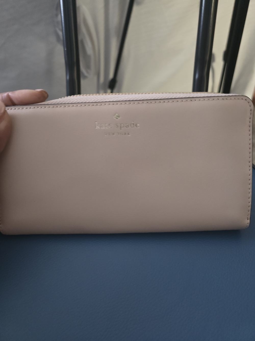kate spade pale pink zip-around leather wallet